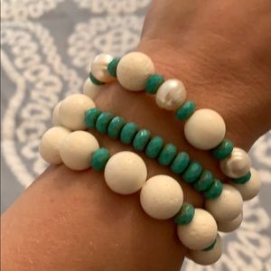 Set of three handmade stretchy bracelets.
